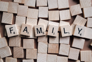 The word "family" spelled out on scrabble tiles