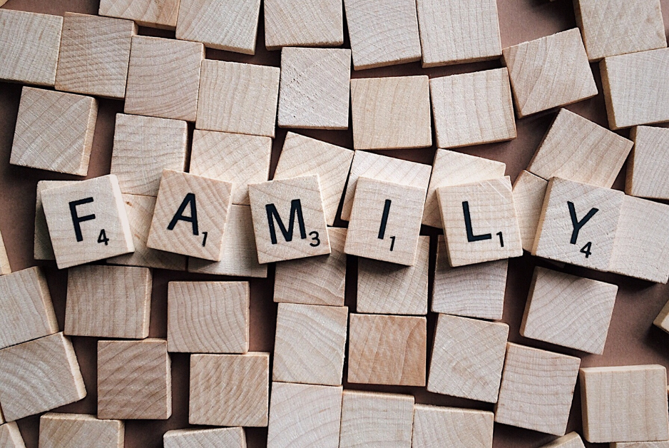 The word "family" spelled out on scrabble tiles